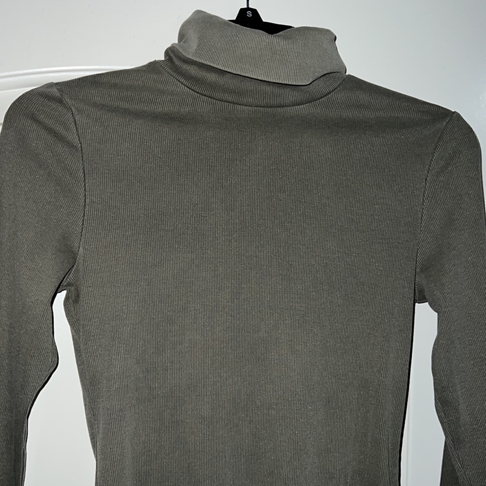 Green turtle neck